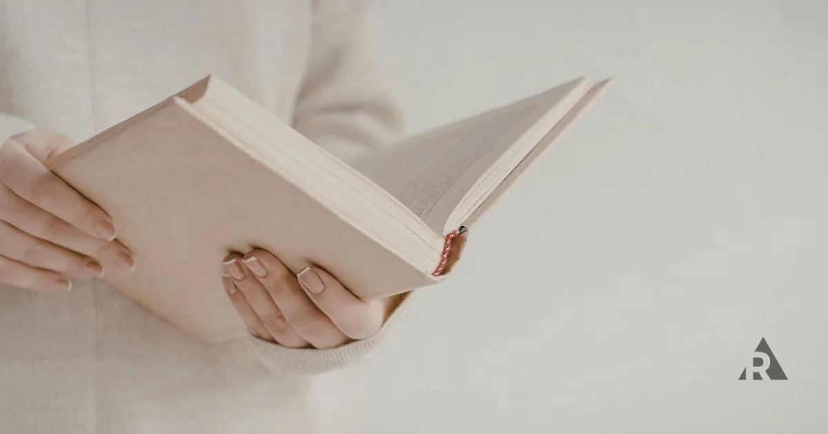 Women reading Scrum Guide