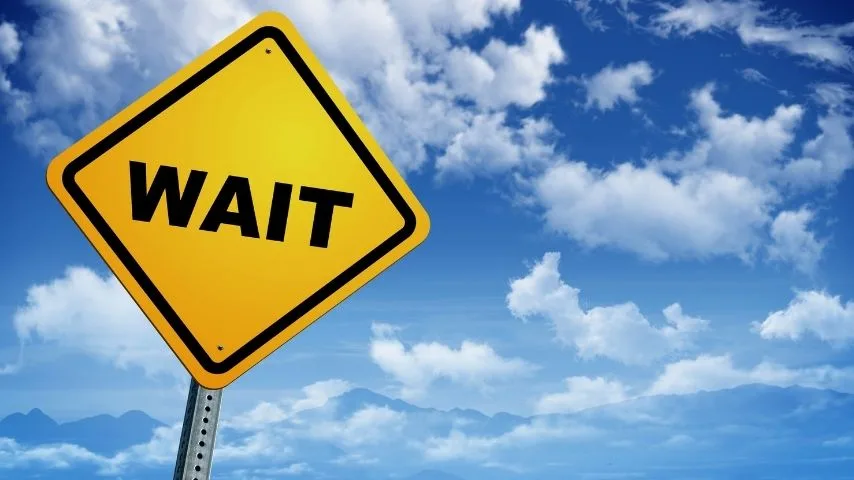 wait caution sign