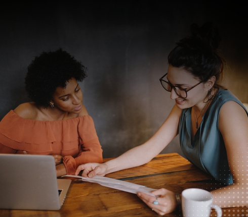 why attend training women working together at a table