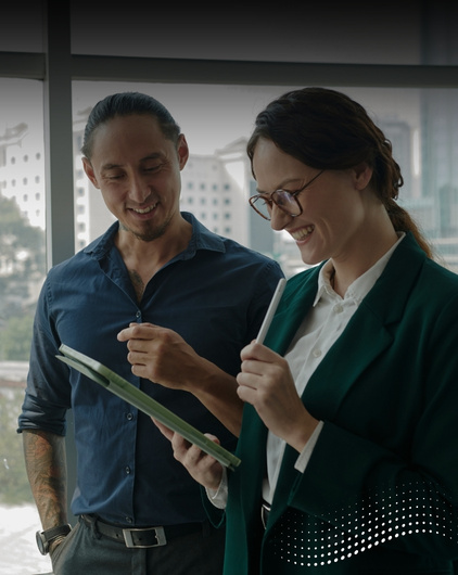 Coworkers Reading Feedback from Clients
